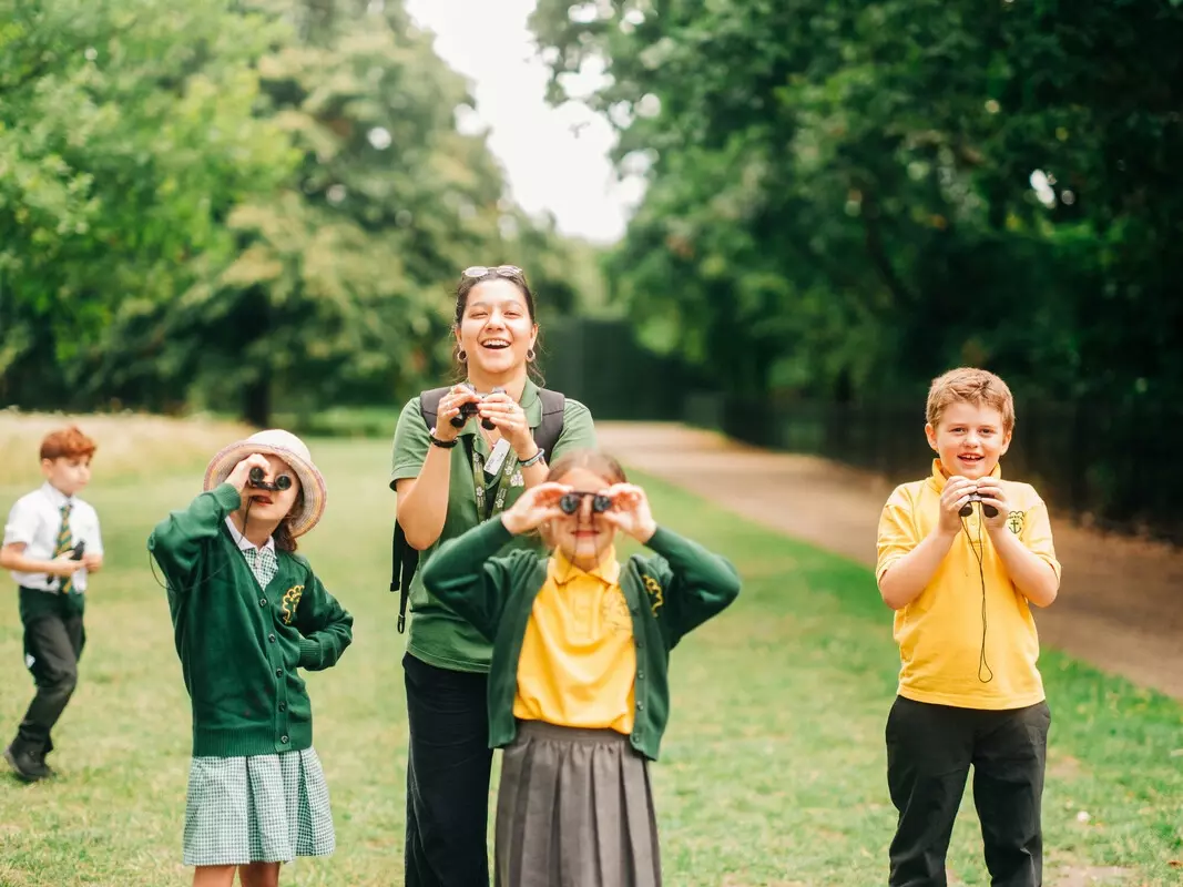 Learning Volunteer bird watching with children.